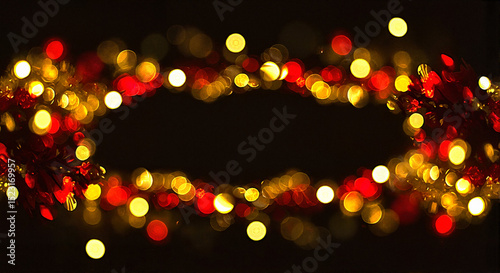 Colorful bokeh lights in red and gold on a dark background  