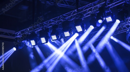 Stage lighting with spotlights being installed on aluminum concert stage