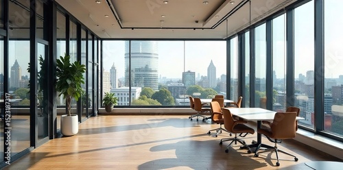 Modern London office space with large windows offering natural light and city views, ideal for a productive work environment , technology, real estate