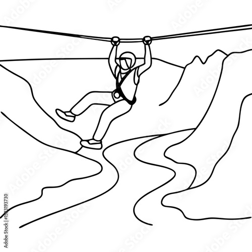 Person ziplining across canyon. Exciting adventure activity with person suspended on zip line above deep canyon.