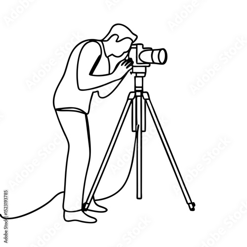 Photographer using tripod camera for professional photoshoot.  Person taking photos with professional camera equipment on tripod stand.