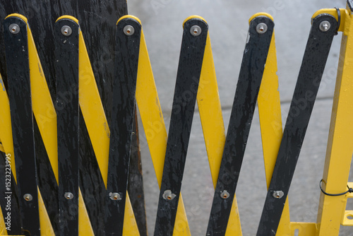 close up of an expandable metal barricade