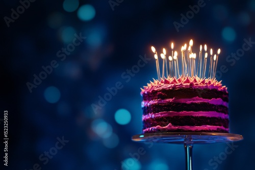 Colorful Birthday Cake With Candles Lit up for Celebration at Night Event