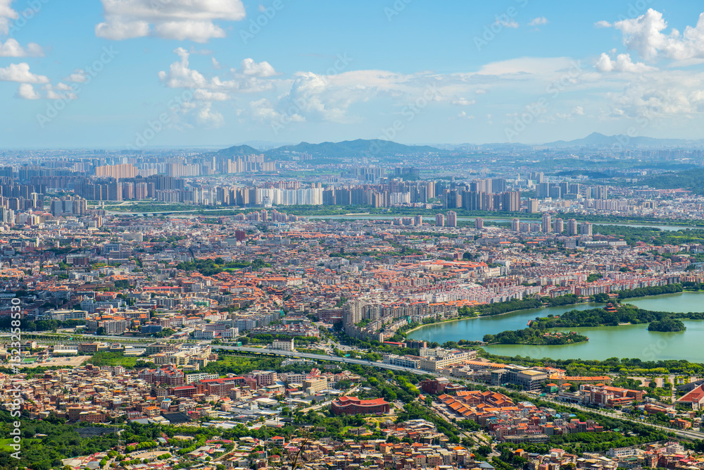 Fototapeta premium Quanzhou city aerial view including historic Licheng district and Xihu (West Lake) Park, from top of Mount Qingyuan, Quanzhou, Fujian Province, China. 
