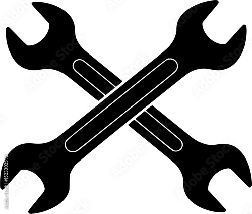 Crossed wrenches symbolizing repair tools for mechanics and handymen in a workshop setting
