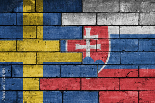 Photography colourful painted big national flag of slovakia and flag of sweden on a massive old brick wall background