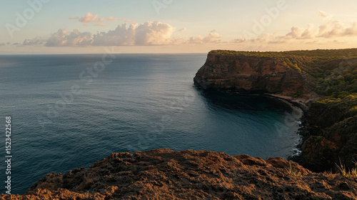 Goal of Life Mindset, Success, Calm and Goal symbol. Scenic coastline at sunset with rocky cliffs and calm waters reflecting the sky.