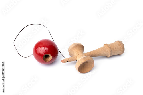 Vintage Old toys that have been played with there are traces damage of play. Cup and ball game Kendama traditional wooden japanese skill toy isolated on white background.