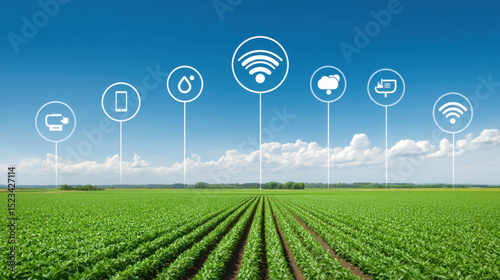 Smart agriculture field with wireless technology icons showing cloud connected farming and data monitoring system