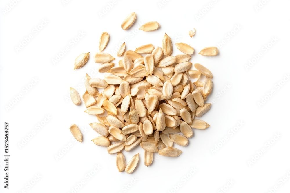 Obraz premium A pile of sunflower seeds isolated on white background
