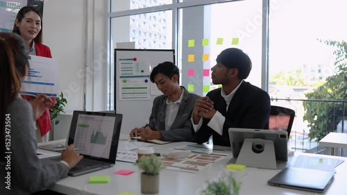 a group of employees are having a meeting with business people to discuss cooperation between the companies, a group of businessmen are presenting their investment plans in a conference room