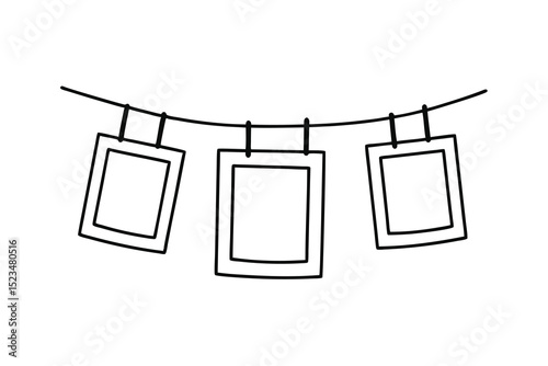 Three blank photo frames hanging on a line drawing