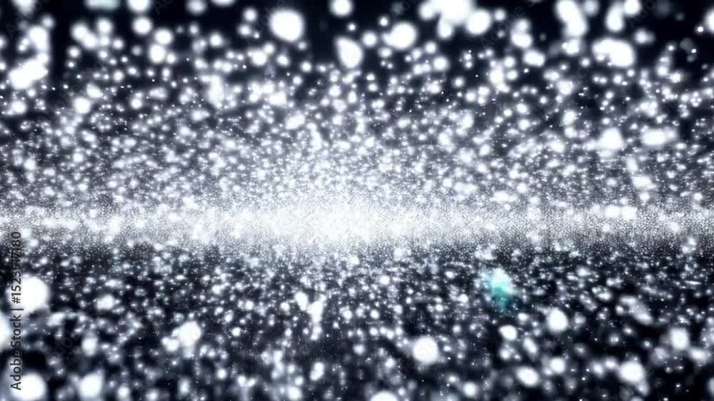 Silver bokeh lights float in a dark space creating a depth of field effect with bright center