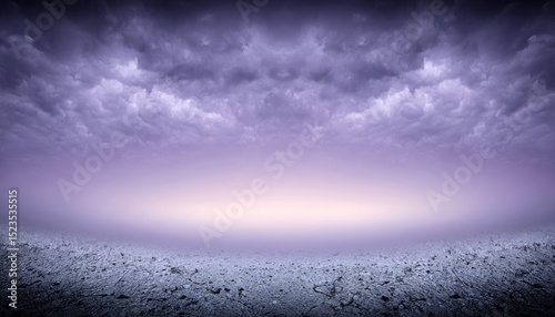 Dramatic, purple sky over barren landscape photo