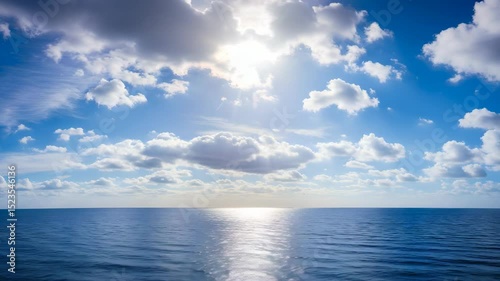 Wallpaper Mural Calm Blue Sea Under Sunny Sky With Fluffy White Clouds Reflecting Sunlight Torontodigital.ca