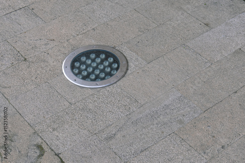 LED street lamp on the sidewalk. Lighting in parks and walking areas of the city. An electric lamp for the street.