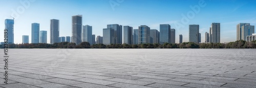 Expansive Cityscape of Modern Skyscrapers Against Clear Blue Sky