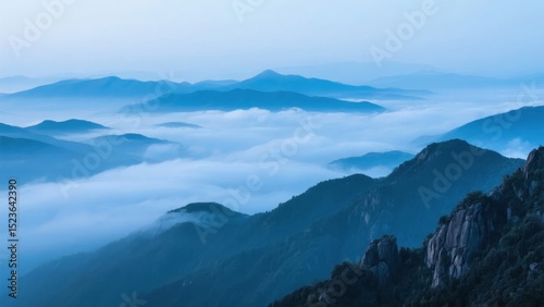 Misty Mountain Landscape with Rolling Clouds