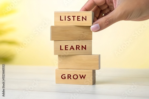 Listen, Learn, Grow – Motivational Concept with Wooden Blocks, Personal Development