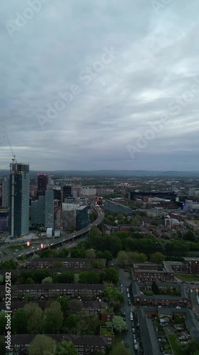 High Angle Footage of Greater Manchester Central City During Sunset, England Great Britain. Drone Camera Footage Was Captured During Cloudy Sunset Time on May 4th, 2024
