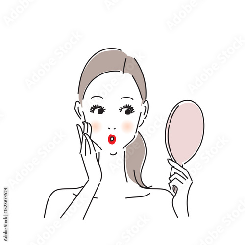 手鏡でお肌をチェックする可愛い女性
