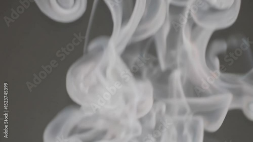 Soft steam rises gently toward the camera, swirling in slow motion. Warm, atmospheric, and immersive—perfect for transitions, mood setting, or sensory close-ups