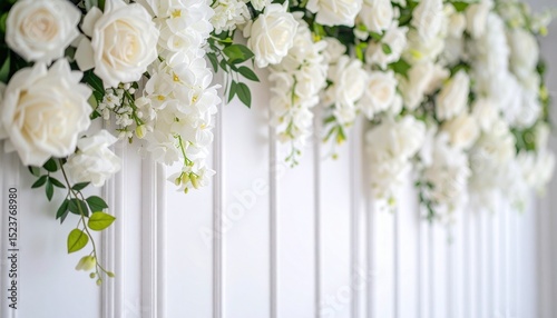  Graceful photography background with minimalist white wall panels and delicate floral details, perfect for weddings and maternity portraits.