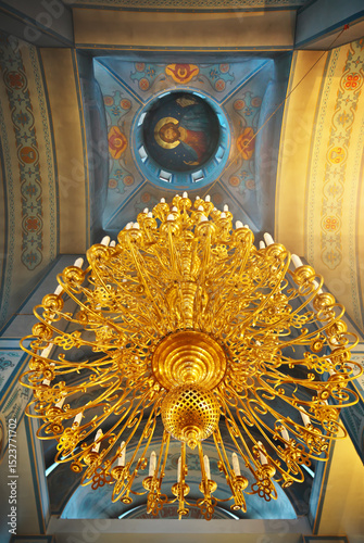 An Orthodox Christ church with massive chandelier.