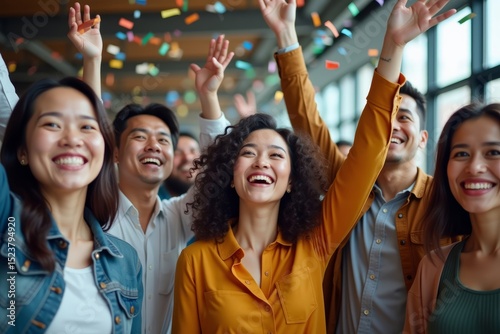Happy Asian Team Celebrates Business Success with Confetti