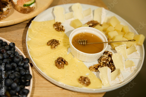Delicious Cheese Platter with Honey photo