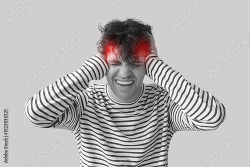Young man suffering from he...