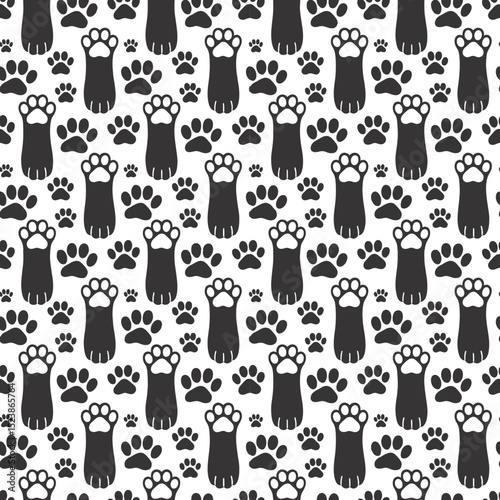 Seamless pattern of dark gray paw prints and feet on transparent background, concept for textile design, wrapping paper, pet shop branding
