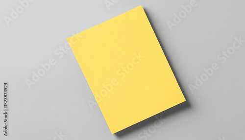 Minimalist yellow paper mockup on gray background — perfect for branding, flyer templates, poster design, or modern stationery presentations in marketing, editorial, and print mockup projects