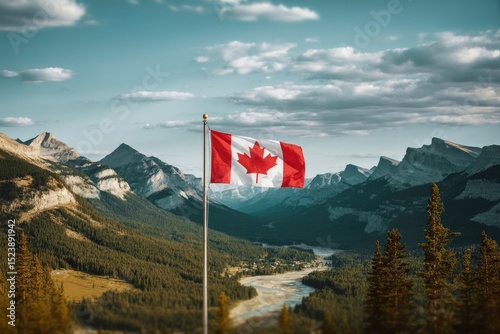 Canadian flag with mountain and small town views in summer