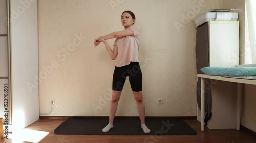 Woman Exercising at Home: Preparation Stance on Yoga Mat