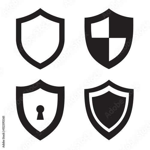 Set of four black and white shield icons representing protection and security concepts silhouette