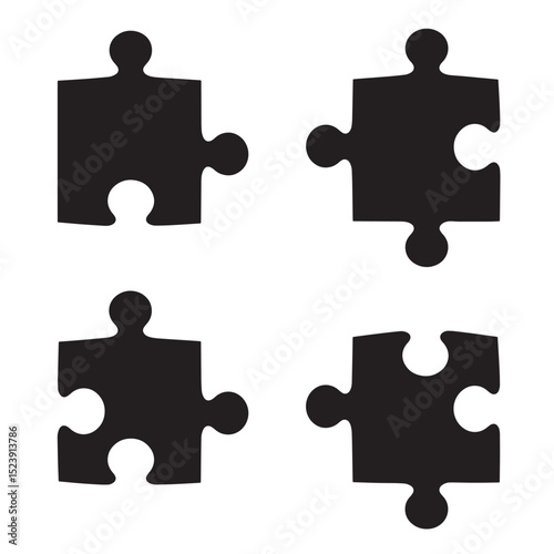 Four black silhouette puzzle pieces on white background teamwork concept