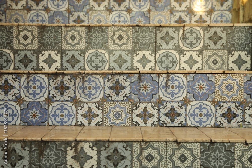 Obraz premium Stairs decorated with beautiful tiles indoors, closeup