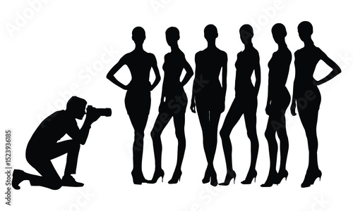 Photographer shooting silhouettes of fashion models