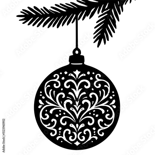Elegant black Christmas ornament hanging from a pine branch  