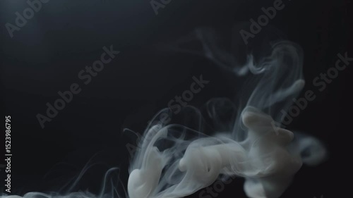 Abstract smoke swirls against a black background