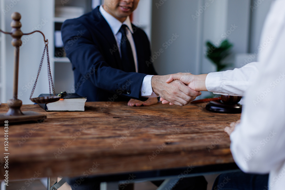 Justice Statue, Gavel, handshake lawyer, handshake, lawyer, Lawyer Handshake in Business Meeting with Scales of Justice and Gavel on Desk, Symbolizing Legal Agreement and Partnership in Office.
Justice Statue, Gavel, handshake lawyer, handshake, lawyer, Lawyer Handshake in Business Meeting with Scales of Justice and Gavel on Desk, Symbolizing Legal Agreement and Partnership in Office.