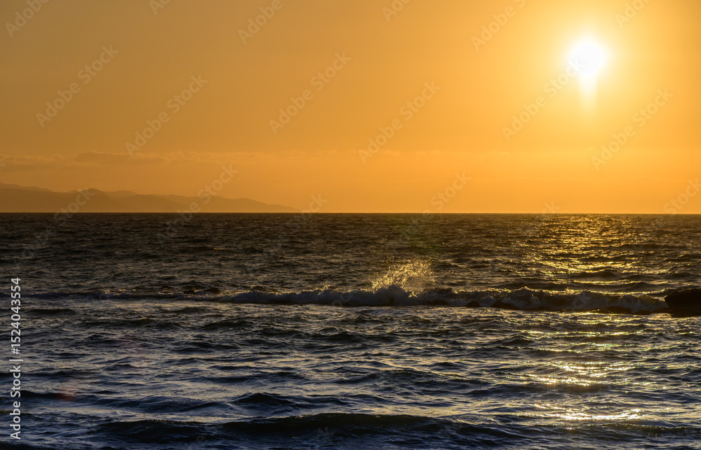 Fototapeta premium Sunset Over the Mediterranean Sea Coast in Cyprus