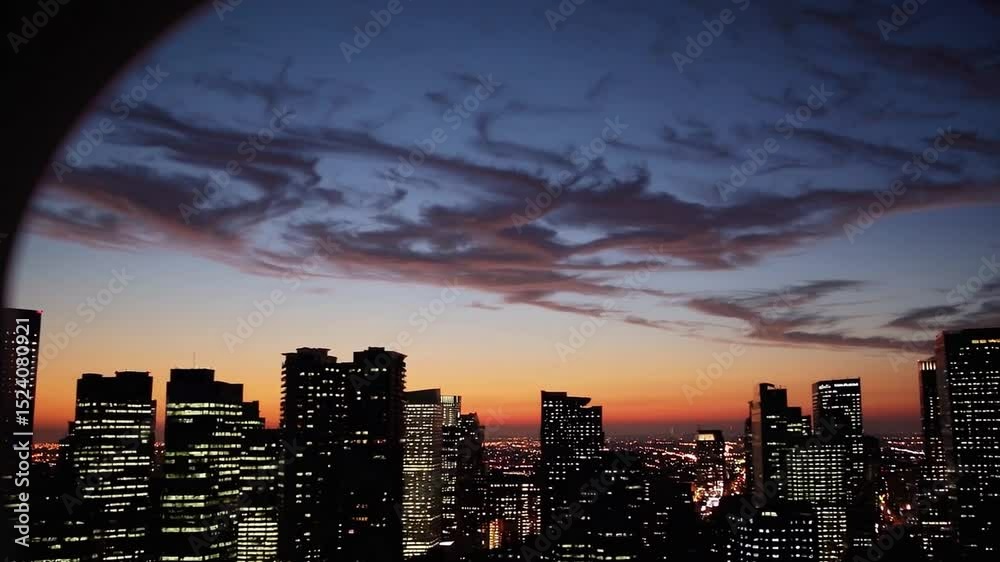 Breathtaking City Skyline at Dusk with Colorful Clouds and Bright City Lights in Urban Setting Breathtaking City Skyline at Dusk with Colorful Clouds and Bright City Lights in Urban Setting