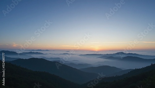 Scenic landscape of mountains at sunrise with a stunning view of the horizon