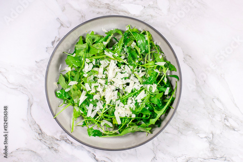 Fresh arugula salad with cheese