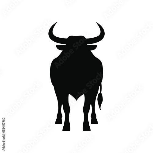 Powerful black bull silhouette rear view
