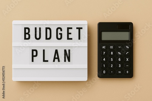 Budget Planning Concept with Calculator and Letter Board on Brown Background