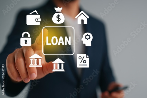 Businessman Selecting Loan Icon with Graphical Symbols on Screen