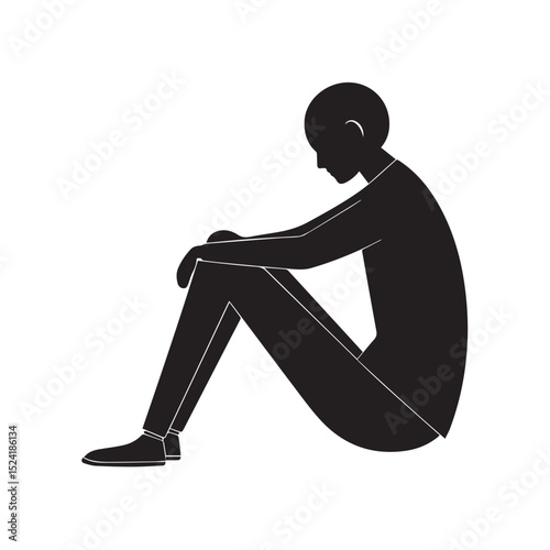 Silhouette of a person sitting alone feeling sad and depressed